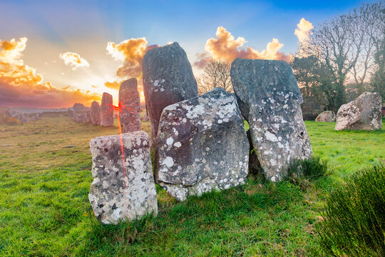 Carnac Alignments, Brittany France, at sunrise. More than 3000 megaliths, dolmen and tumuli which were placed in position over  6000 years ago.