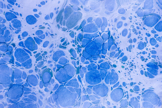 ebru art or marbling art on paper abstract background, liquid marble pattern background 