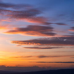 Obraz premium Vibrant sunset over horizon