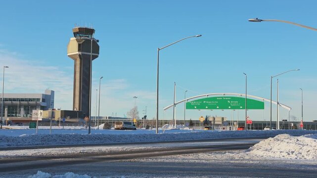 Winter Road to the Ted Stevens Anchorage International Airport with Air Control Tower, Alaska.