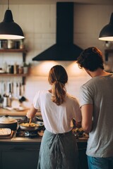 Young caucasian couple cooking together in modern kitchen