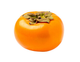 A bright orange, ripe fruit with a leafy green top, isolated on black