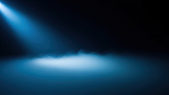 Mysterious blue spotlight beam illuminating foggy atmosphere