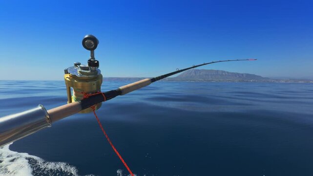 Denia and Javea Costa Blanca trolling fishing rods on boat in Mediterranean Sea