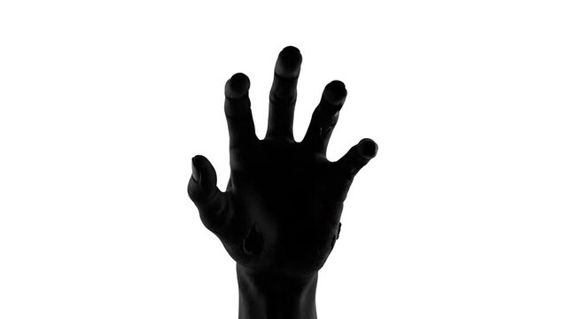 Black Hand Reaching Up Against White Background, Abstract Concept