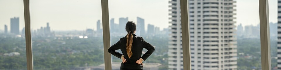 Banner architect woman in suit thinking planning thoughtful inspection on empty office interior...