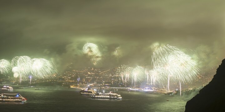 New Year's Eve fireworks, dusk, Atlantic Ocean, harbour with cruise ships, Funchal, Madeira, Portugal