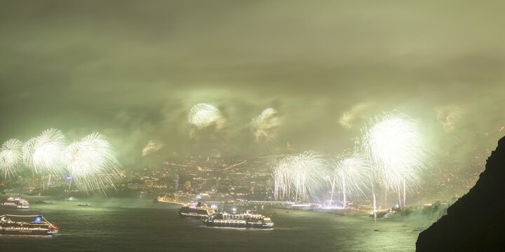 New Year's Eve fireworks, dusk, Atlantic Ocean, harbour with cruise ships, Funchal, Madeira, Portugal