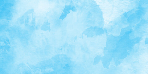 Obraz premium Light sky blue white watercolor background, blue watercolor background wallpaper, ethereal cloud like pattern creates peaceful, aquarelle paint paper textured canvas element for text design.