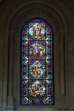 Colourful stained glass windows, Notre-Dame Cathedral, former episcopal church of the diocese of Lausanne, today the main reformed church of the city of Lausanne, canton of Vaud, Switzerland