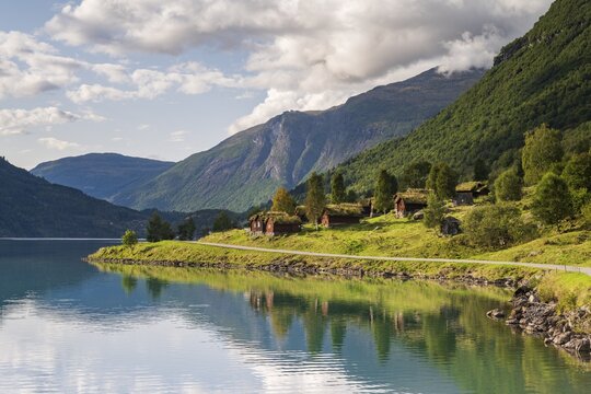 Traditional cabins on the shores of Lake Lovatnet, Breng seter, Loen, Stryn, Norway