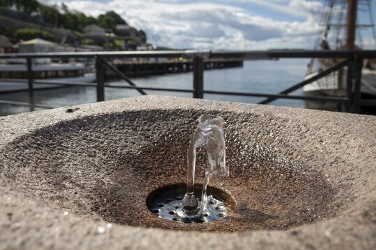 Small fountain, drinking water, Aker Brygge, Oslo Fjord, Oslo, Norway