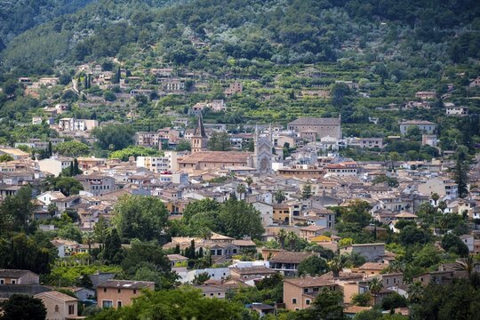 Houses of the village Soller with church Sant Bartomeu de S&oacute;ller, Serra de Tramuntana, Majorca, Balearic Islands, Spain