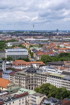 View over Munich, residential buildings in the city, in the back university building of the Technical University Munich, Olympic Tower and Olympic Park, Munich, Bavaria, Germany
