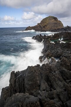 High waves on the sea, volcanic rock in bizarre shapes, rocky coast, Porto Moniz, Madeira, Portugal