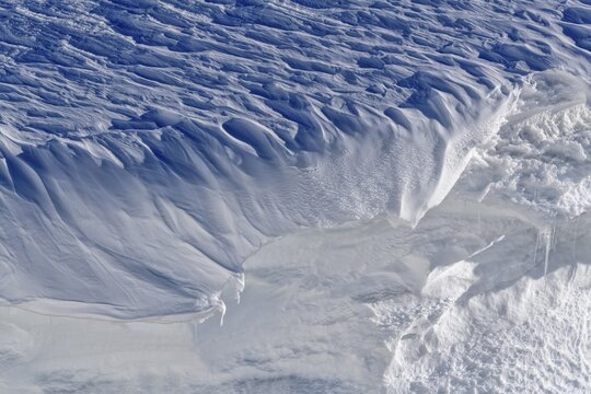 Structured snow cornices in an ice and snow landscape, Gemmi, Valais, Switzerland
