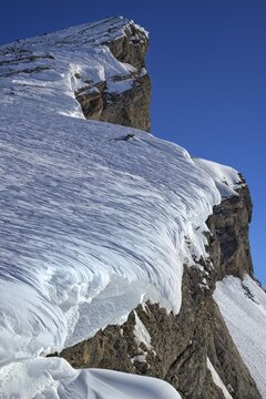 Structured snow cornices in an ice and snow landscape, Gemmi, Valais, Switzerland