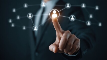 Obraz premium Businessman Interacting with Virtual Network Interface Touching User Icon for Connection and Engagement in Digital World