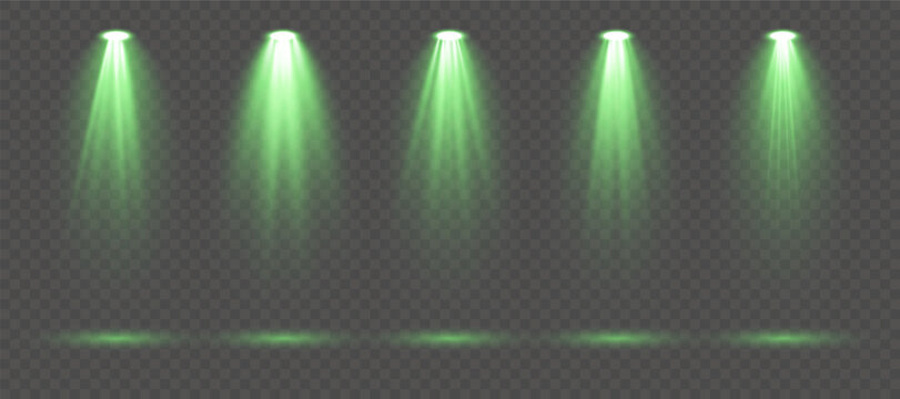 Realistic green spotlight set with intense illumination rays, soft glowing gradients and dramatic beam effects isolated on transparent background perfect for stage scenes, music shows and premium vect