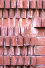 Peeled and weathered red brick texture  