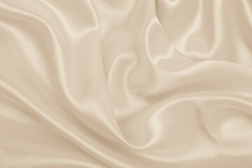 Fototapeta premium Smooth elegant golden silk or satin luxury cloth texture as wedding background. Luxurious background design. In Sepia toned. Retro style