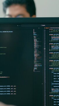 Vertical Screen : Closeup Adult Asia male, female freelance typing write prompt AI bot IT app smart program nomad, video game, terminal with coding language designer, big data center desktop computer.