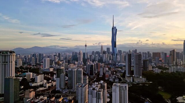 Aerial view of the skyline featuring the Merdeka 118 skyscraper and KL Tower piercing through the urban landscape, Kuala Lumpur, Federal Territory of Kuala Lumpur, Malaysia.
