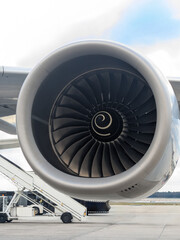 Commercial aircraft jet engine. Large fan with numerous blades