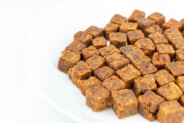 Square-shaped beef jerky pieces