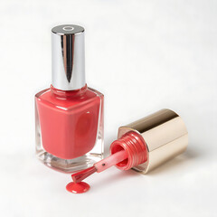 Red nail polish bottle and open brush