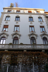 Old residential buildings along via Eschilo in Milan, Italy