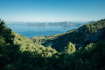 Naklejka premium A picturesque bay surrounded by forested mountains in Turkey