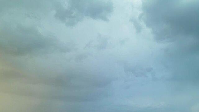 Cloudscape, Timelapse of Soft gradient sky with layered clouds forming a calm atmospheric background