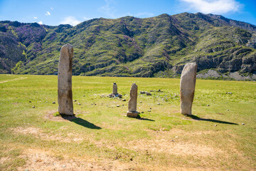 Vertical stone slabs known as Inin steles forming a sacred site near Chuysky Trakt Altai Russia. Spiritual monument used for prayers and worship by Altai people