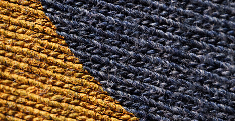 Close-Up of T-Shirt Fabric with Yellow and Blue Paint Detail