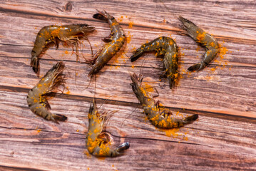 Many Prawn on woden background