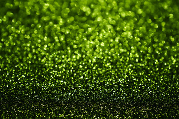 Green Glitter Bokeh Background with Sparkling Emerald Texture