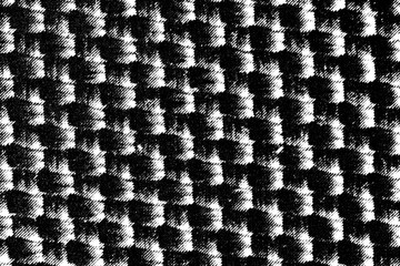 Bold irregular halftone check pattern with rough diagonal shading and strong contrast on a transparent background, forming a textured graphic surface.