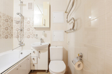 modern bathroom room with toilet and washing machine