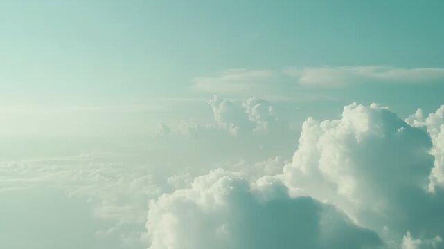 Beautiful cumulus clouds forming a peaceful, ethereal landscape high above, with ample copy space reflecting concepts of freedom, travel, dreams, and tranquility