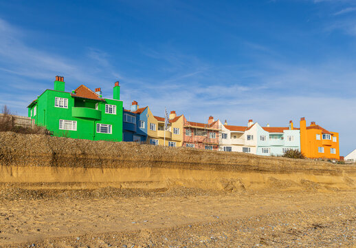 Coastal and cliff erosion on the beach causing a potential danger to properties at the top of the cliff at Thorpeness, Suffolk. UK