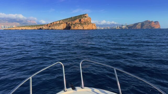 Benidorm Island and city skyline from boat Costa Blanca Spain