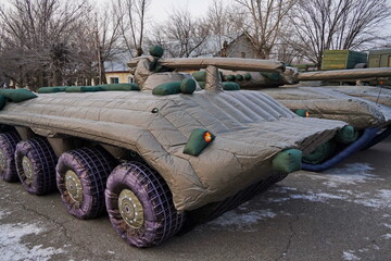 Naklejka premium Almaty, Kazakhstan - 01.20.2026 : Inflatable imitation of military equipment, to deceive the enemy. A false target.