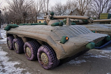 Naklejka premium Almaty, Kazakhstan - 01.20.2026 : Inflatable imitation of military equipment, to deceive the enemy. A false target.