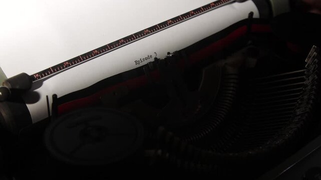 Vintage manual typewriter close up with episode 3 typed on white paper, evoking storytelling, nostalgia, classic communication, and analog writing for writers, media, and creative projects