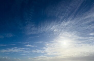 azure blue partly cloudy sky