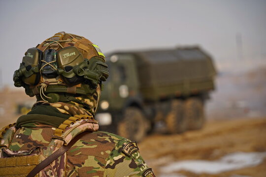 Almaty, Kazakhstan - 01.20.2026 : A soldier in full uniform at a military exercise.