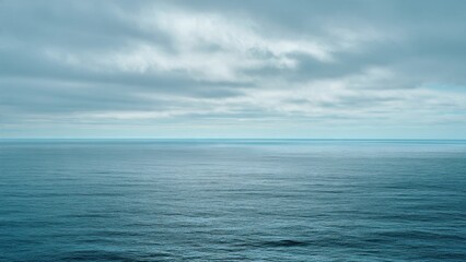 Obraz premium Calm Ocean and Cloudy Sky
