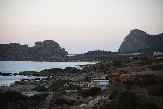 Rugged rocky coastline landscape with mountains and view of the sea bay.