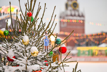 Blurred view of outdoor ice skating rink at Red Square in Moscow, Russia with Christmas tree